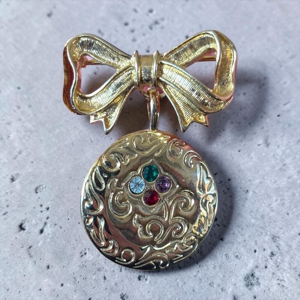 Avon Rhinestone Bow Brooch 1980s Gold Tone Dangle Perfume Tag Pin